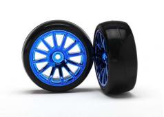 Traxxas TRX7573R Tires & wheels, assembled, glued (12-spoke blue